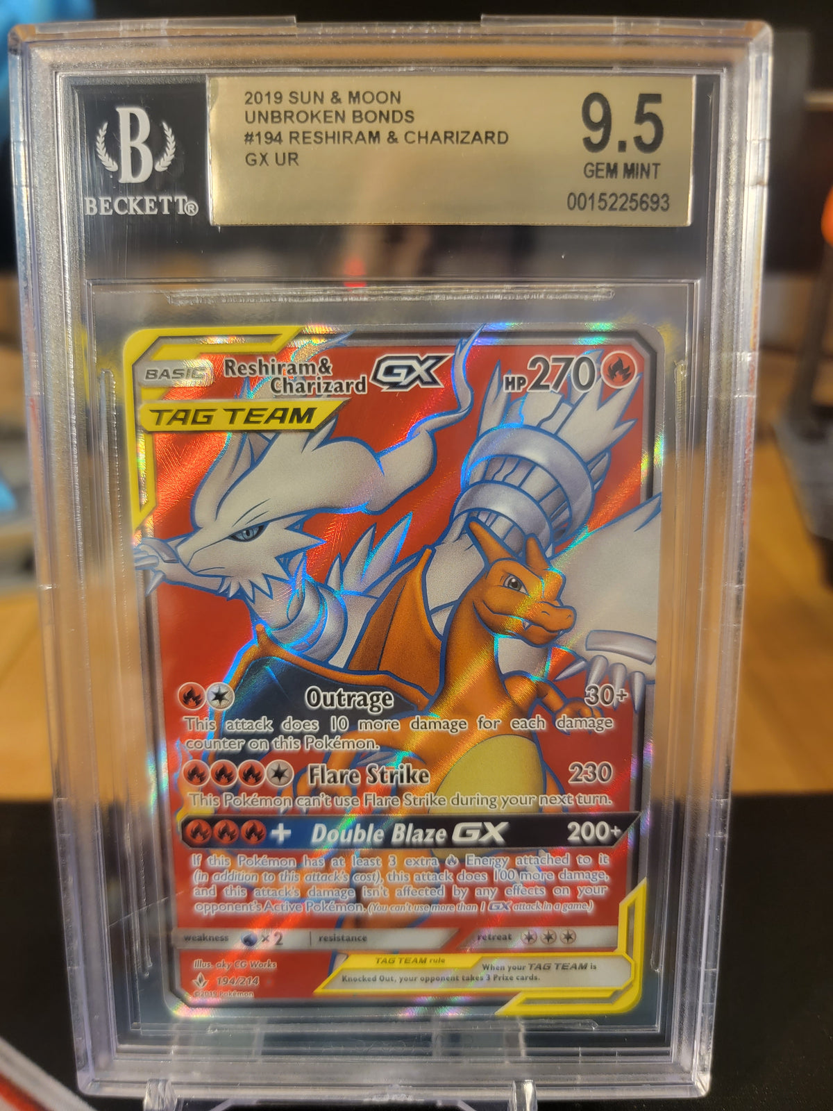 Unbroken Bonds Reshiram & Charizard Full Art BGS 9.5